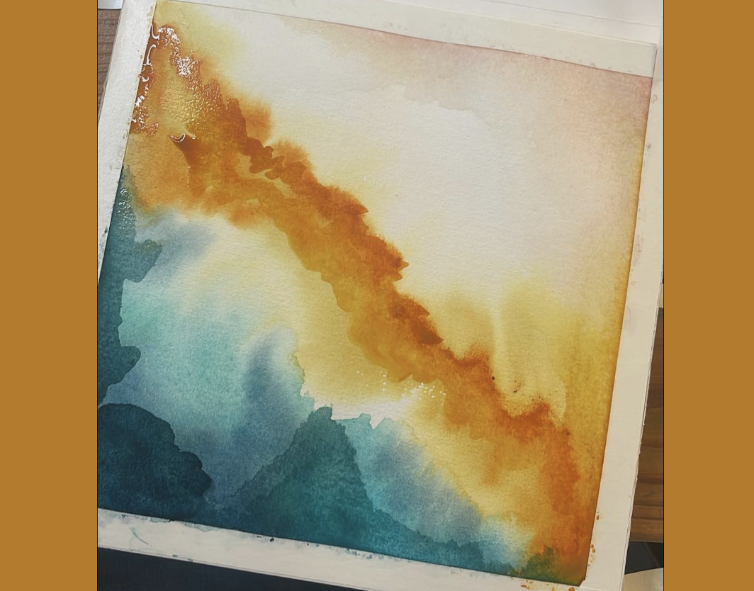 abstract watercolor with oranges and blues with diagonal movement